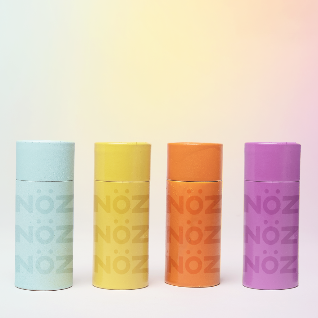 Front view of the full collection of Noz Sunscreen Stick