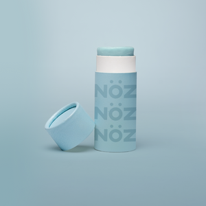 Cap off view of Noz Sunscreen Stick in blue