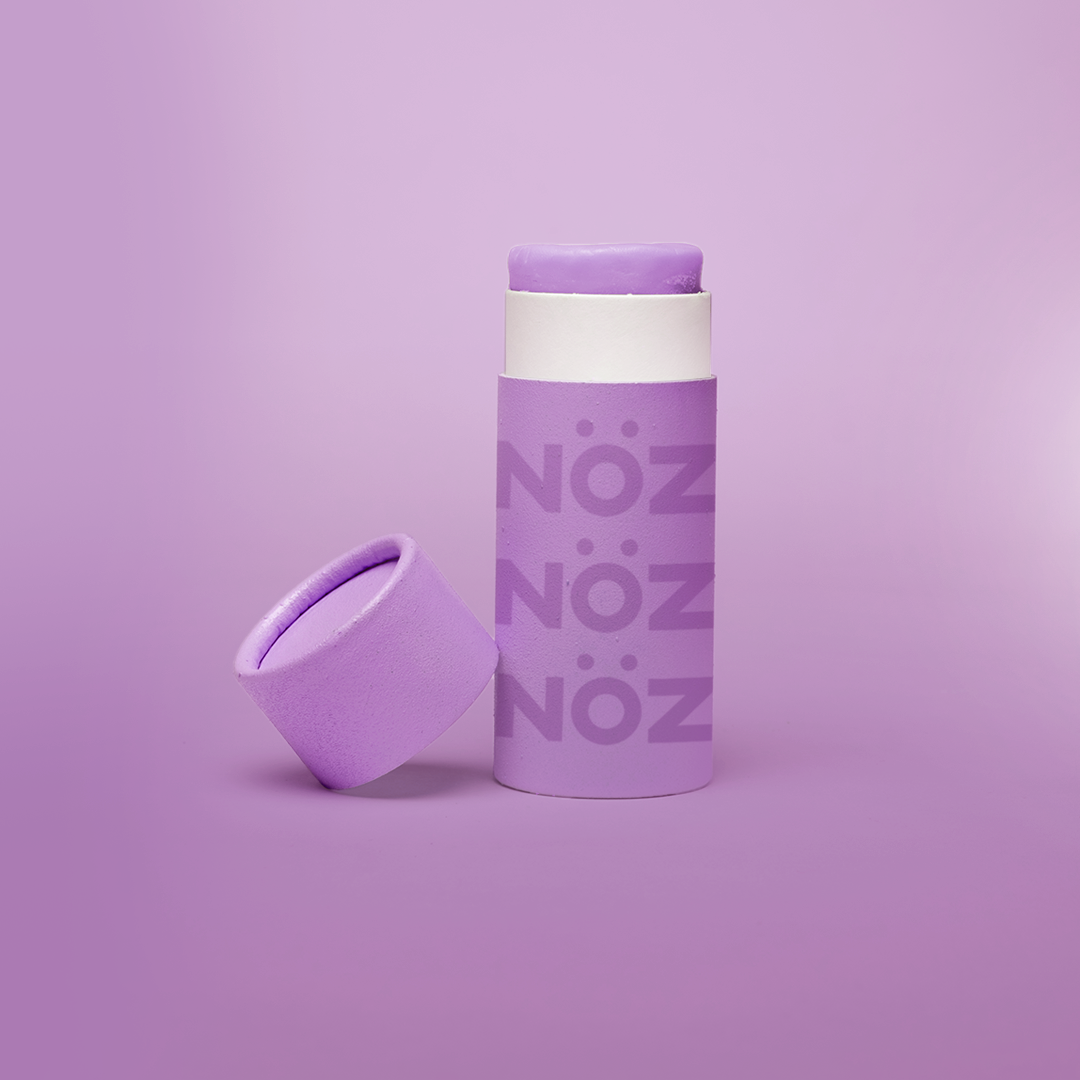 Cap off view of Noz Sunscreen Stick in purple